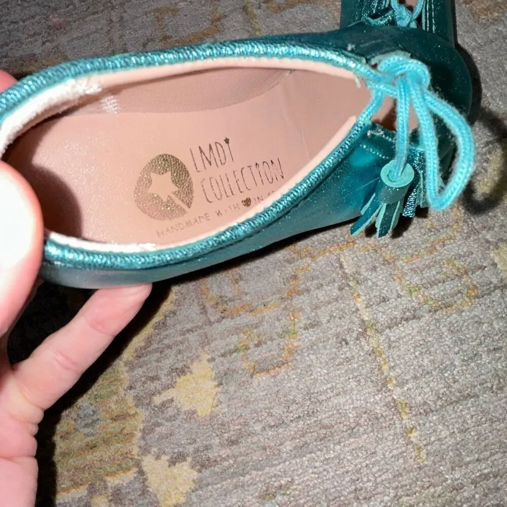 Lmdi collection metallic blue tassel flat sz 26/9-9.5